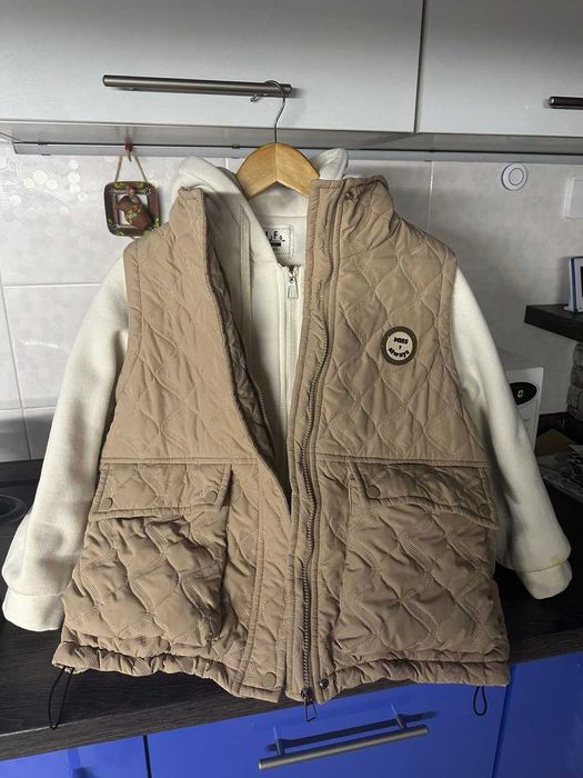 Якісна куртка с жилетом на зріст 140 см.Стан ідеальний