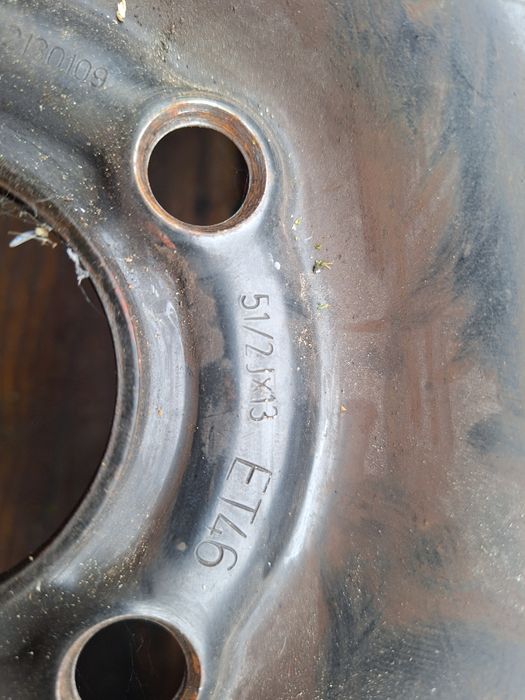 Felgi stalowe GM 13 cali z kołpakami Opel Astra F