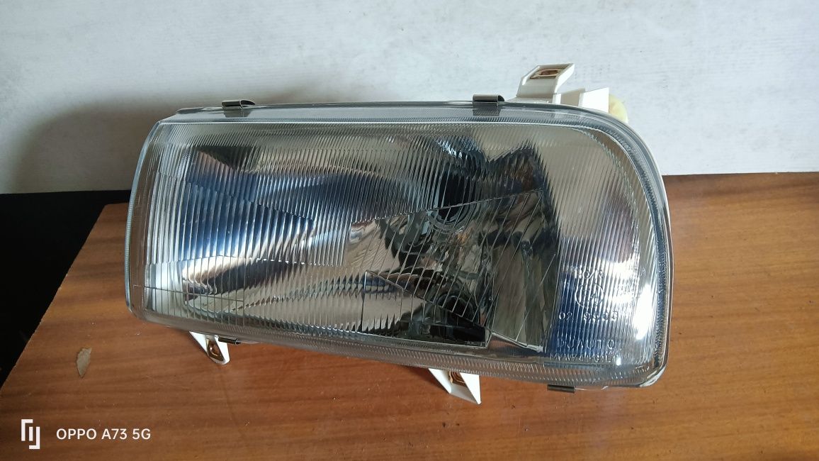Farol VW vento ótica 1992 óptica Esq