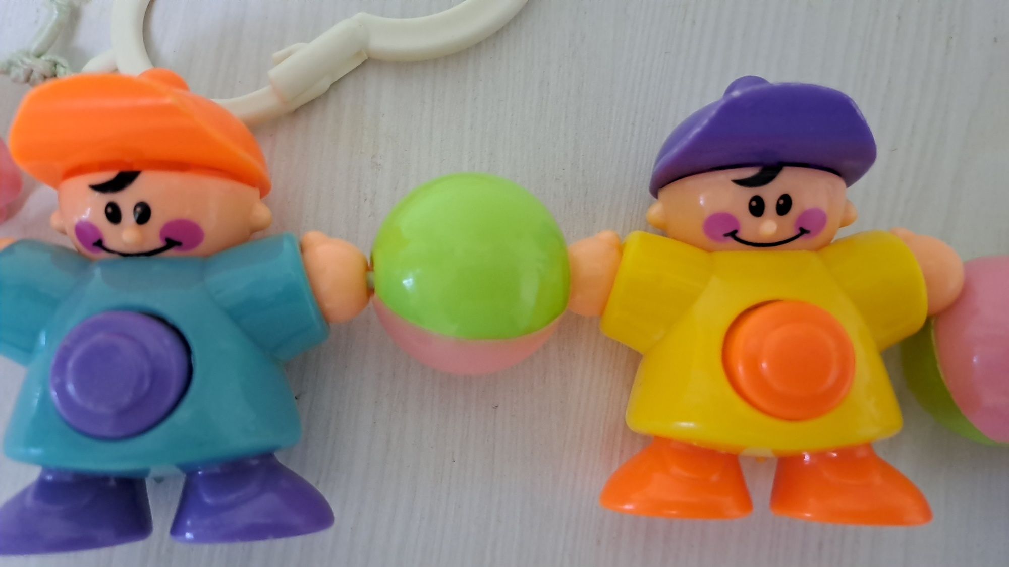 Іграшка на дитячий візочок брязкальце