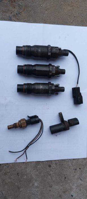 форсунка Crysler Voyager 2.5 TD Dodge RamVan Jeep Grand Cherokee 3.1