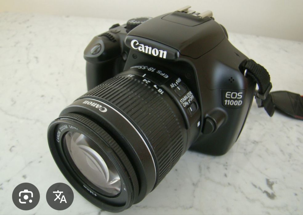 Фотоапарат Canon D1100