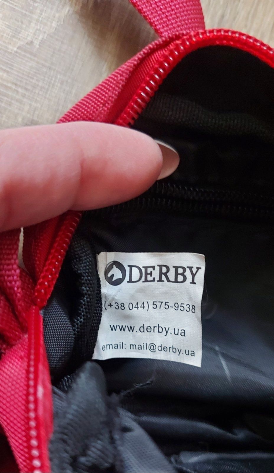 Маленька фірмова сумка derby.