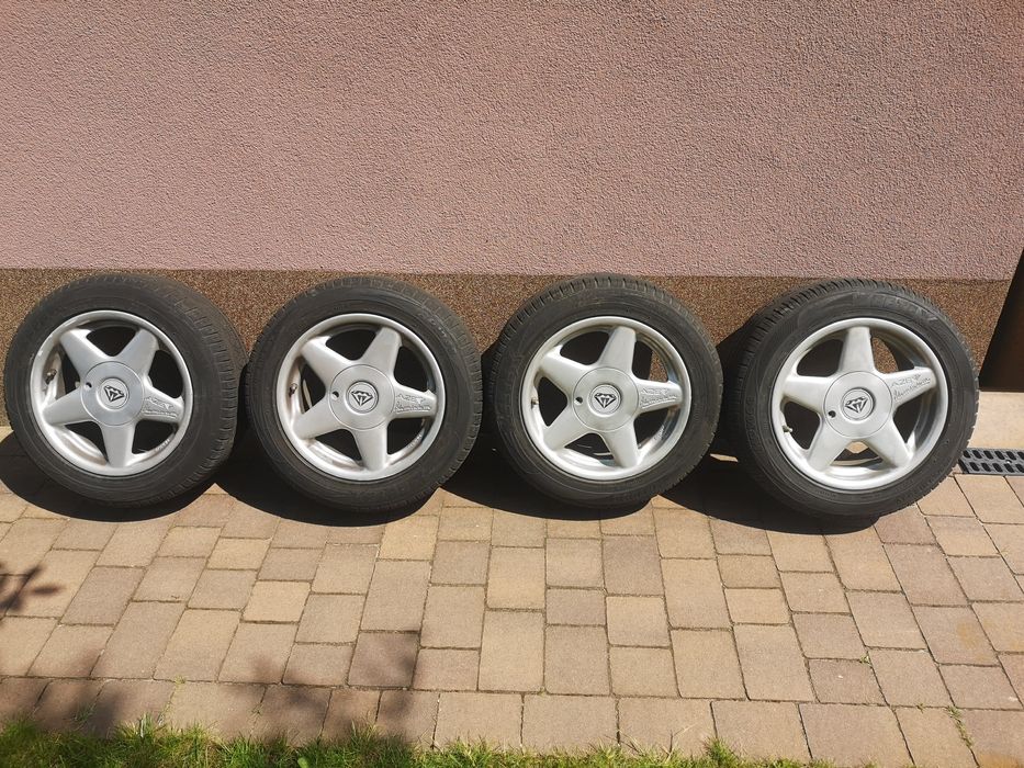 4x felga aluminiowa 15" 4x114.3 ET40 plus opony wielosezonowe