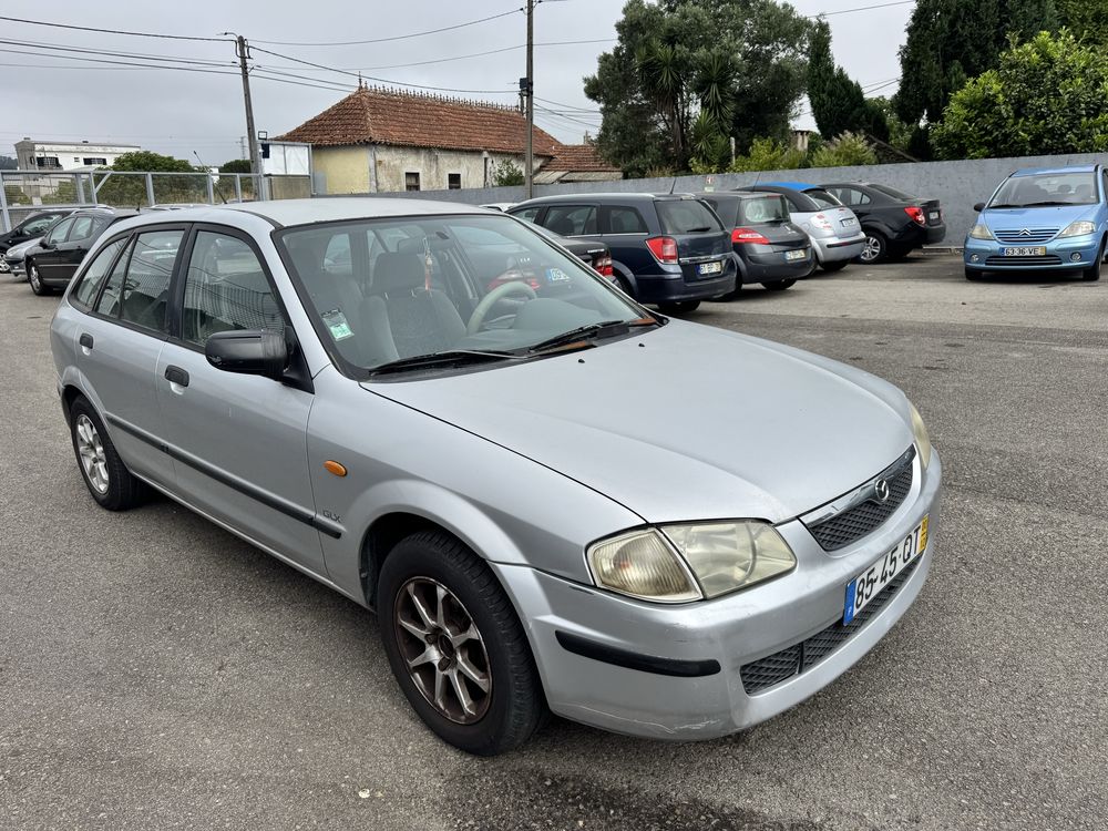 Mazda 323F 1.4i 75CV