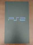 PS2 com vários jogos.