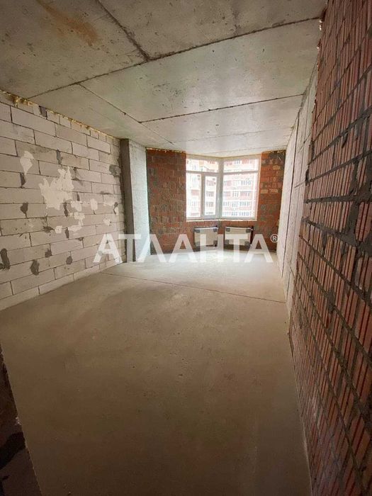 Двухкомнатная квартира в новом современном доме из красного кирпича