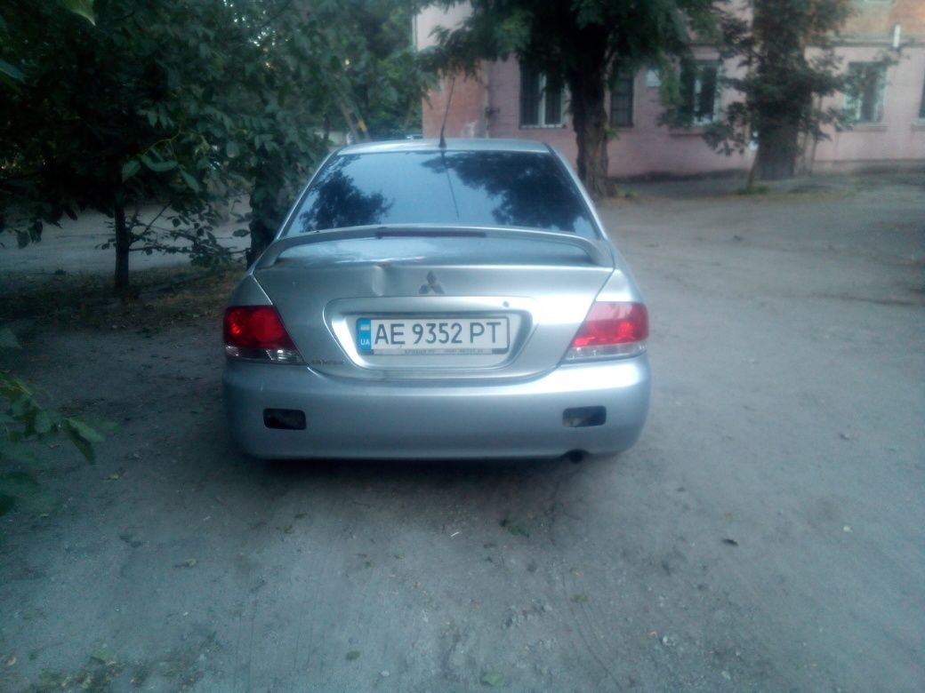 Мицубиси ланцер 2004