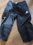 Dwie pary Adidas spodnie bramkarskie  S młodzieżowe i spodenki czarne
