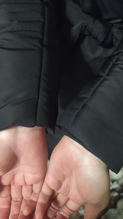 Довгий жіночий пуховик