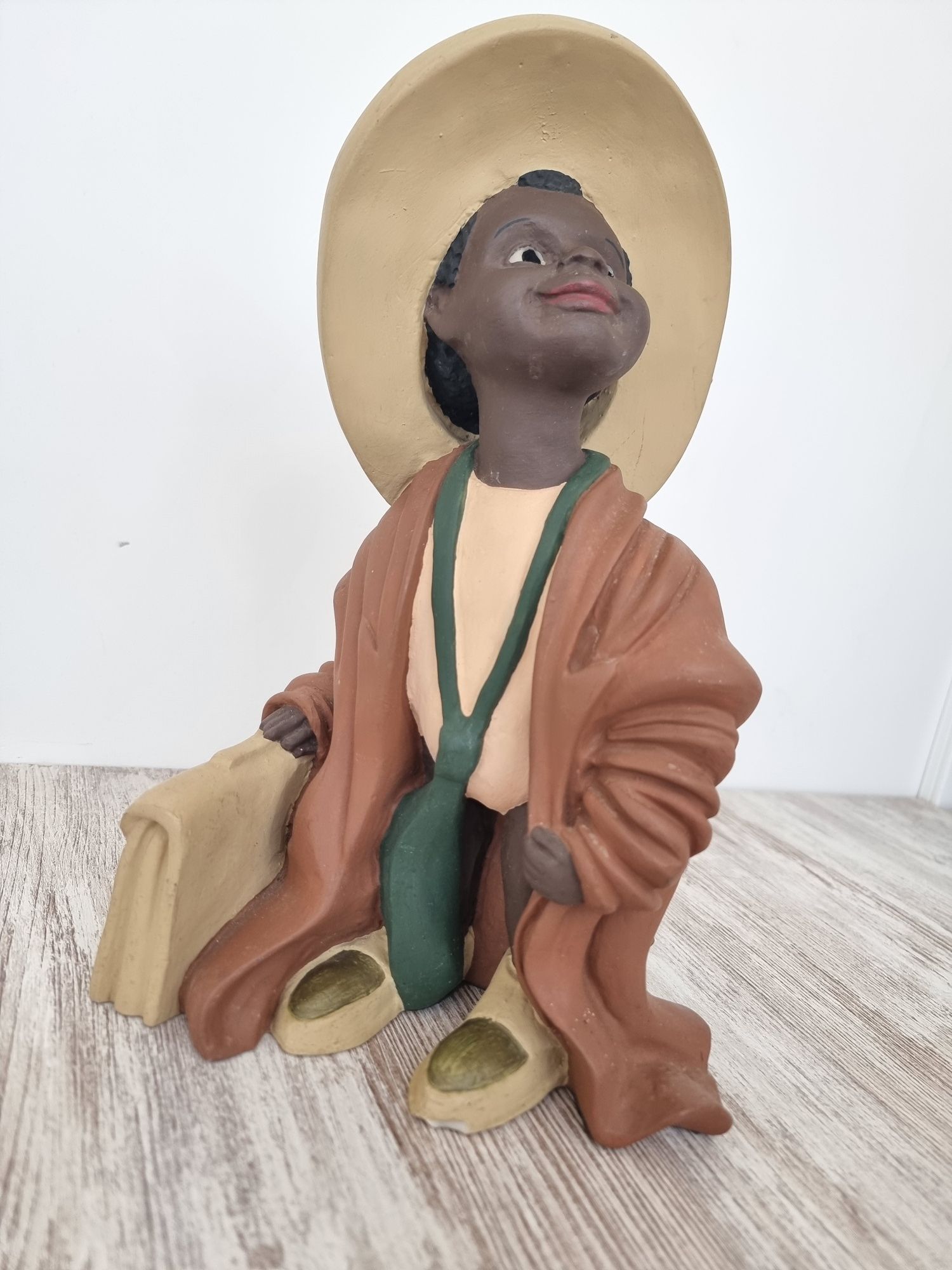 Estatuas de marfinite "Os Pretinhos"