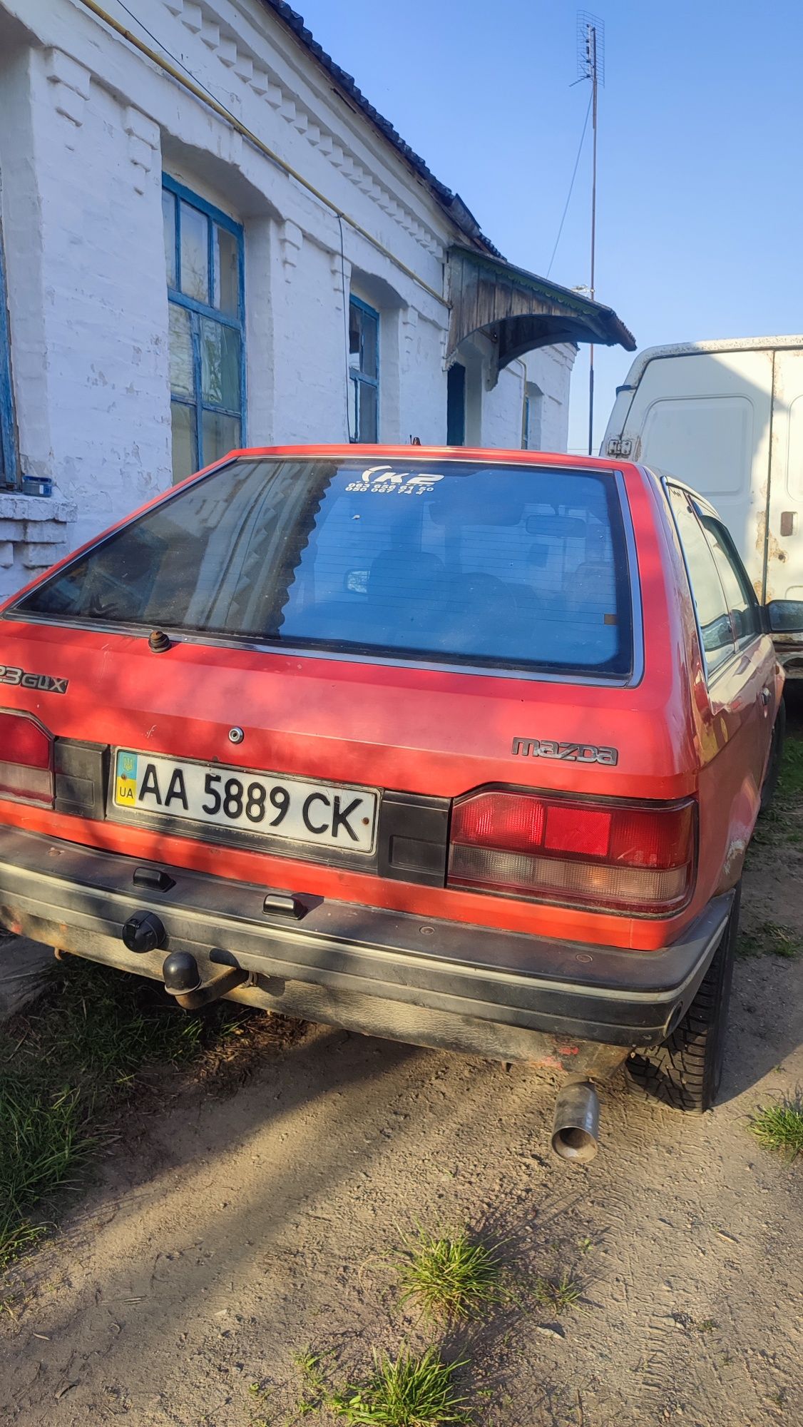 автомобіля Mazda 323