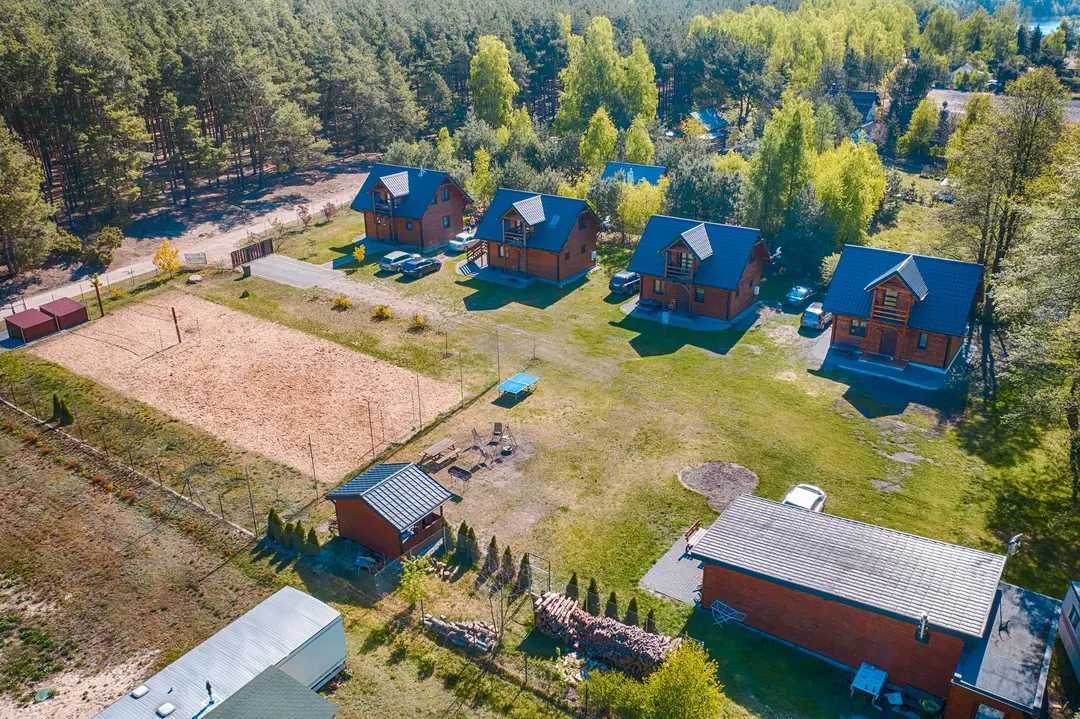 Domki nad jeziorem Skrzyneckim z prywatnym łowiskiem