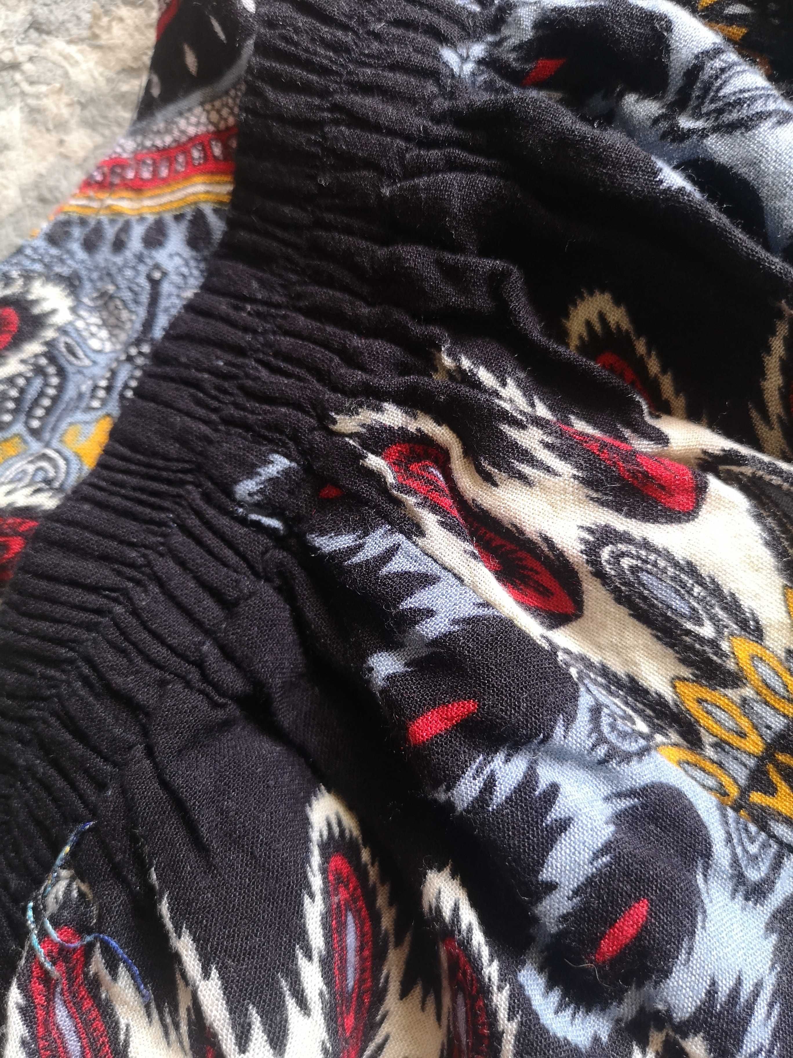 Zwiewne kolorowe spodnie boho 36/38