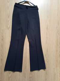 Garniturowe spodnie damskie czarne szerokie nogawki dzwony