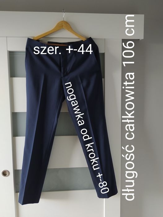 Nowe wizytowe męskie spodnie D+LJ eleganckie W32 wełna granat tanio