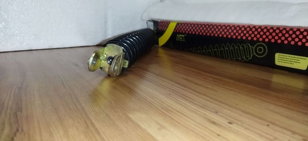 Задній амортизатор скутер універсальний