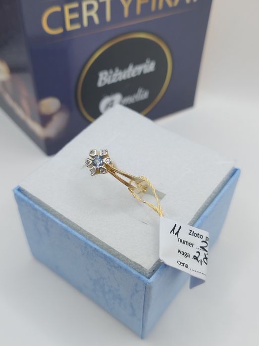 Ciekawy pierścionek ręcznie robiony w złocie próby 585 14K sklep certy