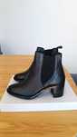 Botas pretas de salto da Seaside