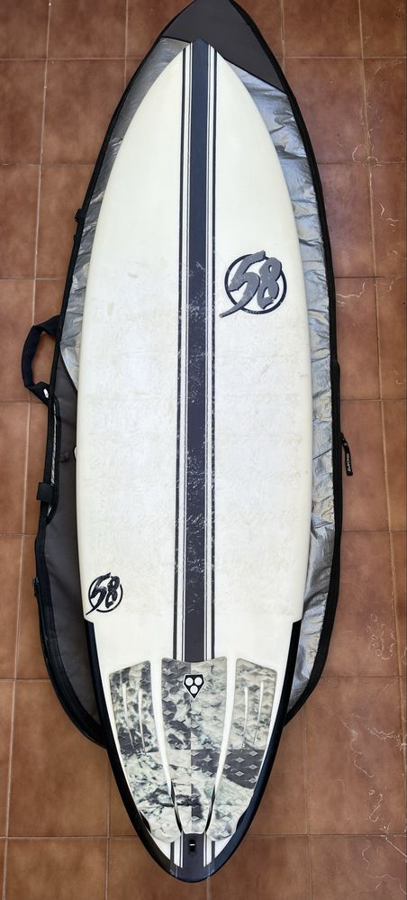 Prancha epoxy 5’9 31L  + saco Dakine