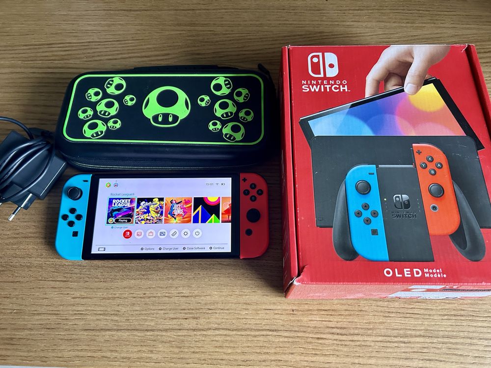 Nintendo  Konsola Switch OLED + Case + Gry