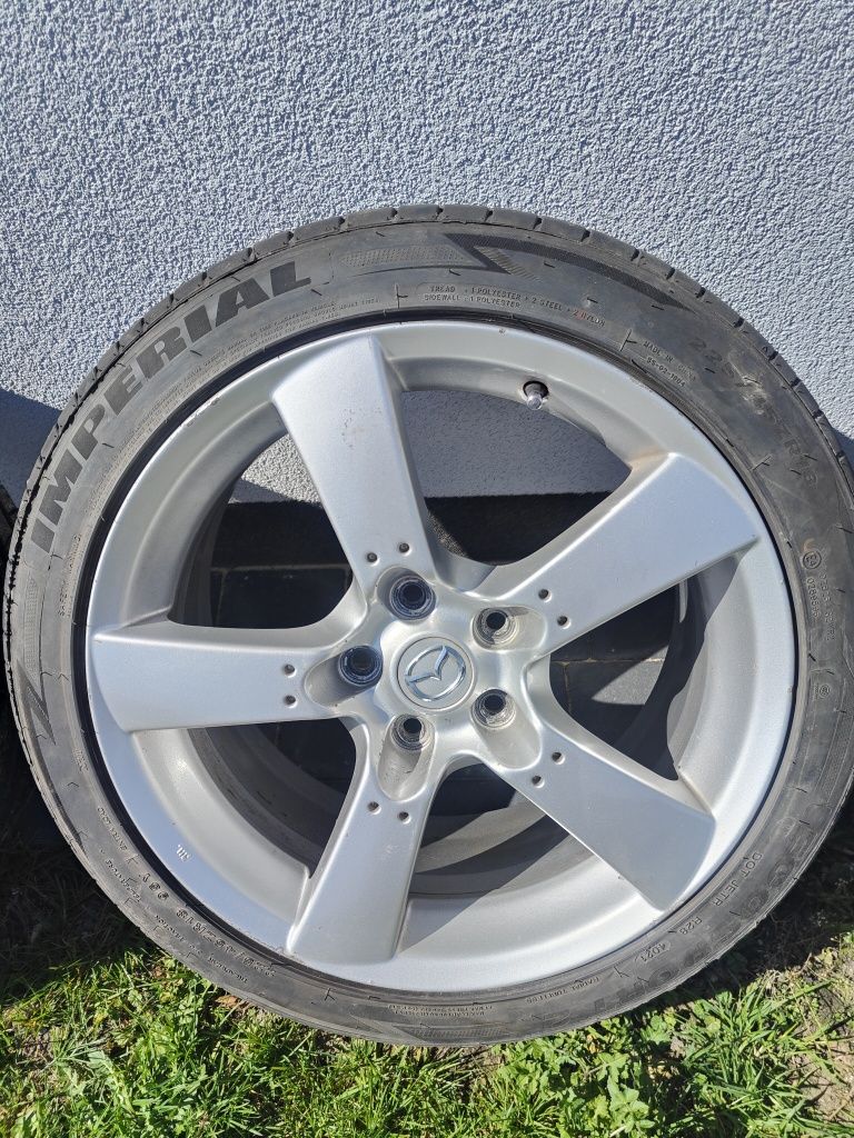 Felgi 5 X 114,3 z oponami OEM Mazda