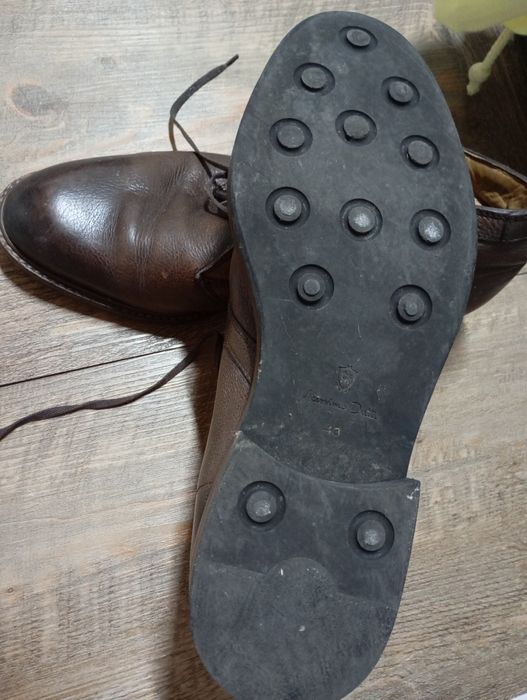 Botas de homem em castanho