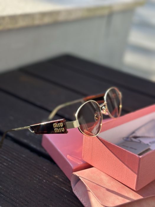 oculos miumiu novos em caixa