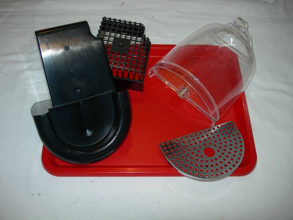 Nespresso.  Apara capsulas e deposito da maquina.
