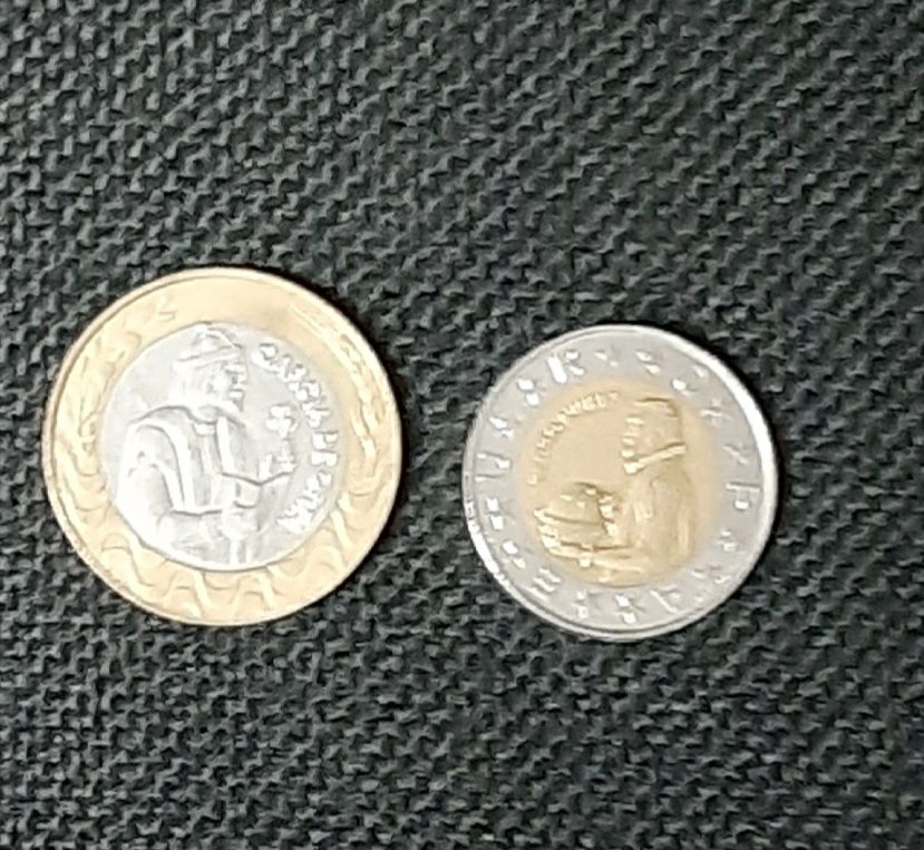 Moedas para despachar 100$00 e 200$00.