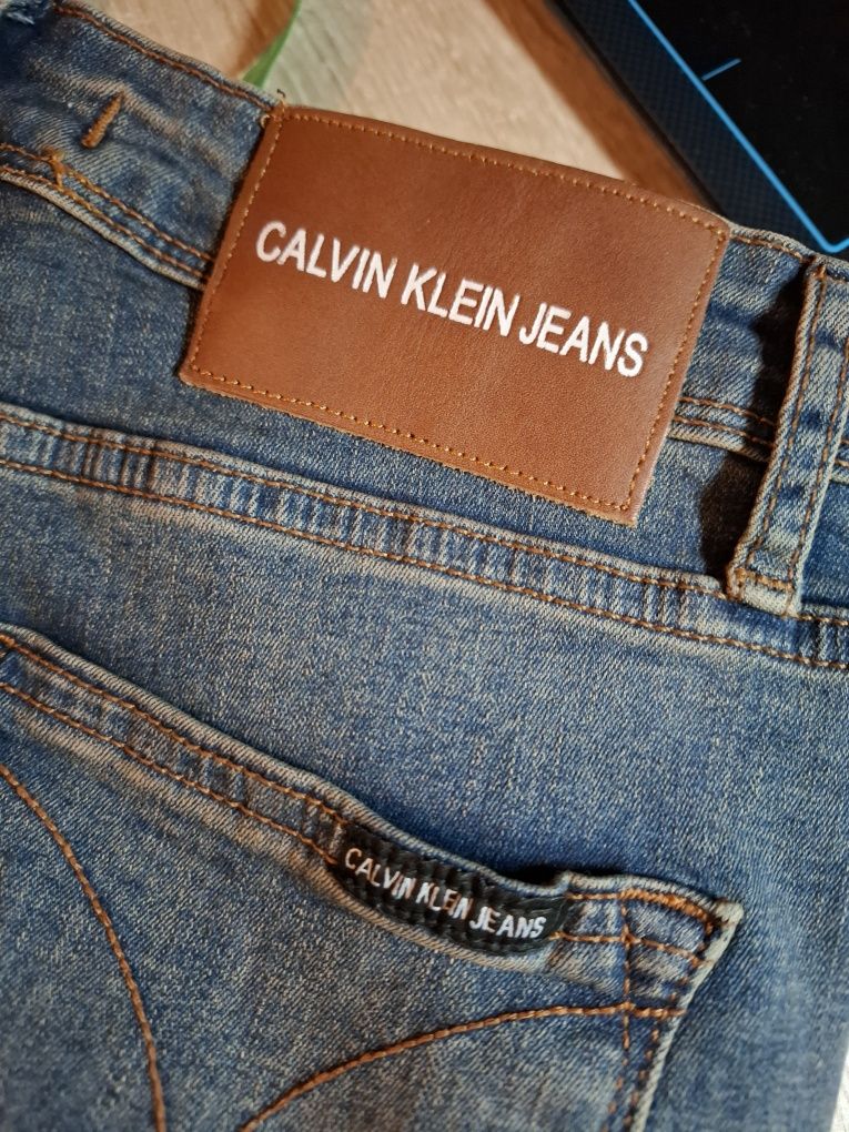 Spodnie jeansy damskie z wysokim stanem Calvin Klein W29 L30