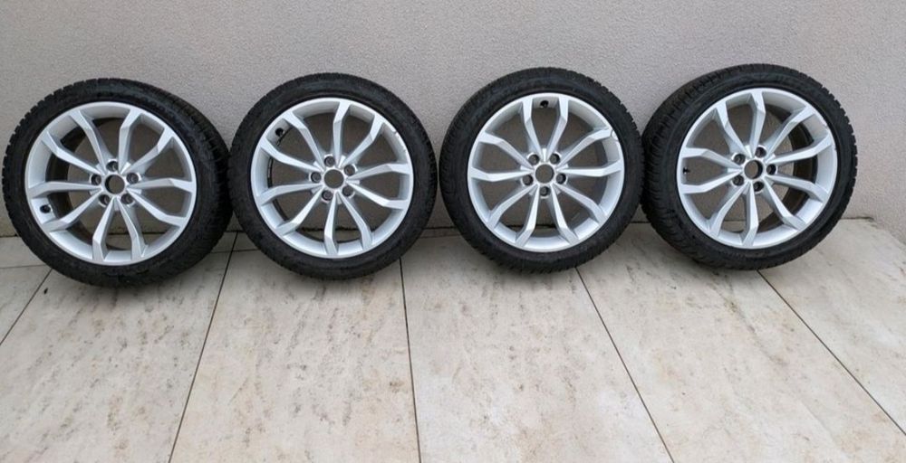 Oryginalne alufelgi Audi 5x112 r18" z oponami zimowymi