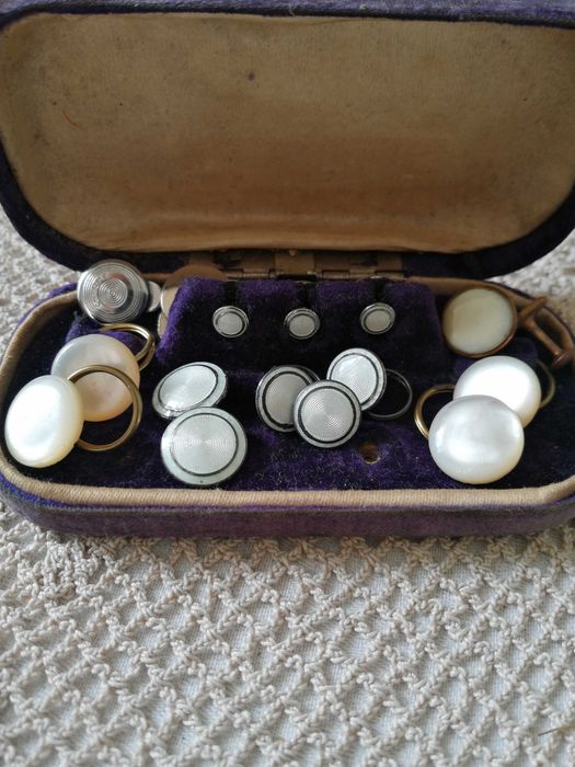 Botões de punho centenários  madrepérola