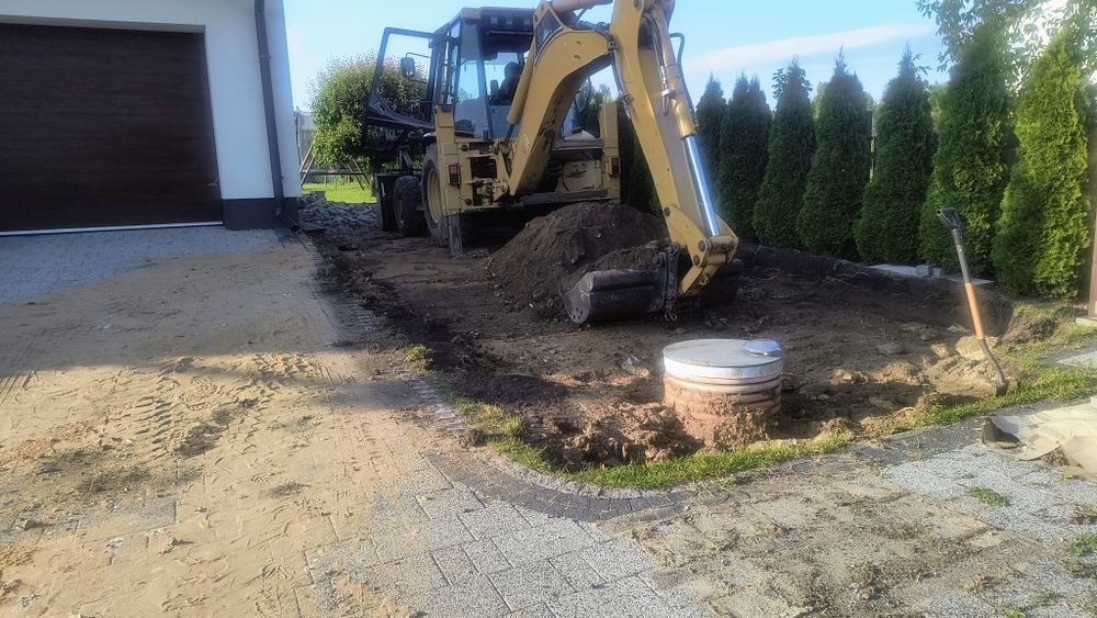 Usługi koparko-ładowarką, prace ziemne, wyburzenia, odśnieżanie.