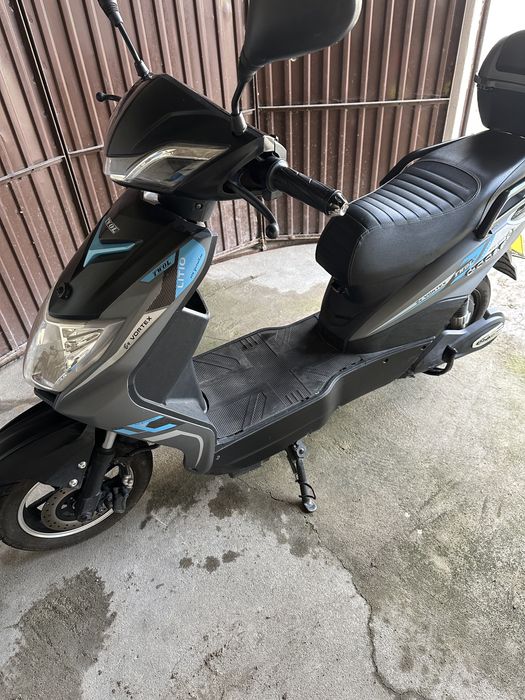 Moto eletroca com documento