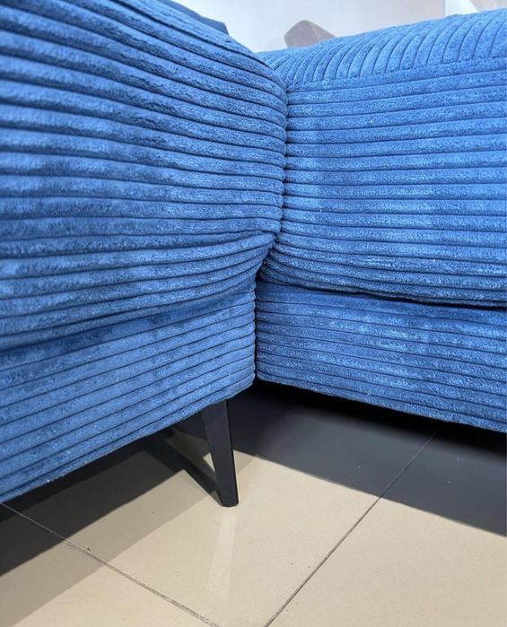 Кутовий нерозкладний диван,синій,з пуфом