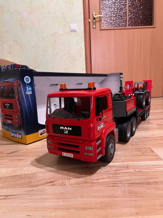 Тягач Bruder MAN TGA з навантажувачем Manitou