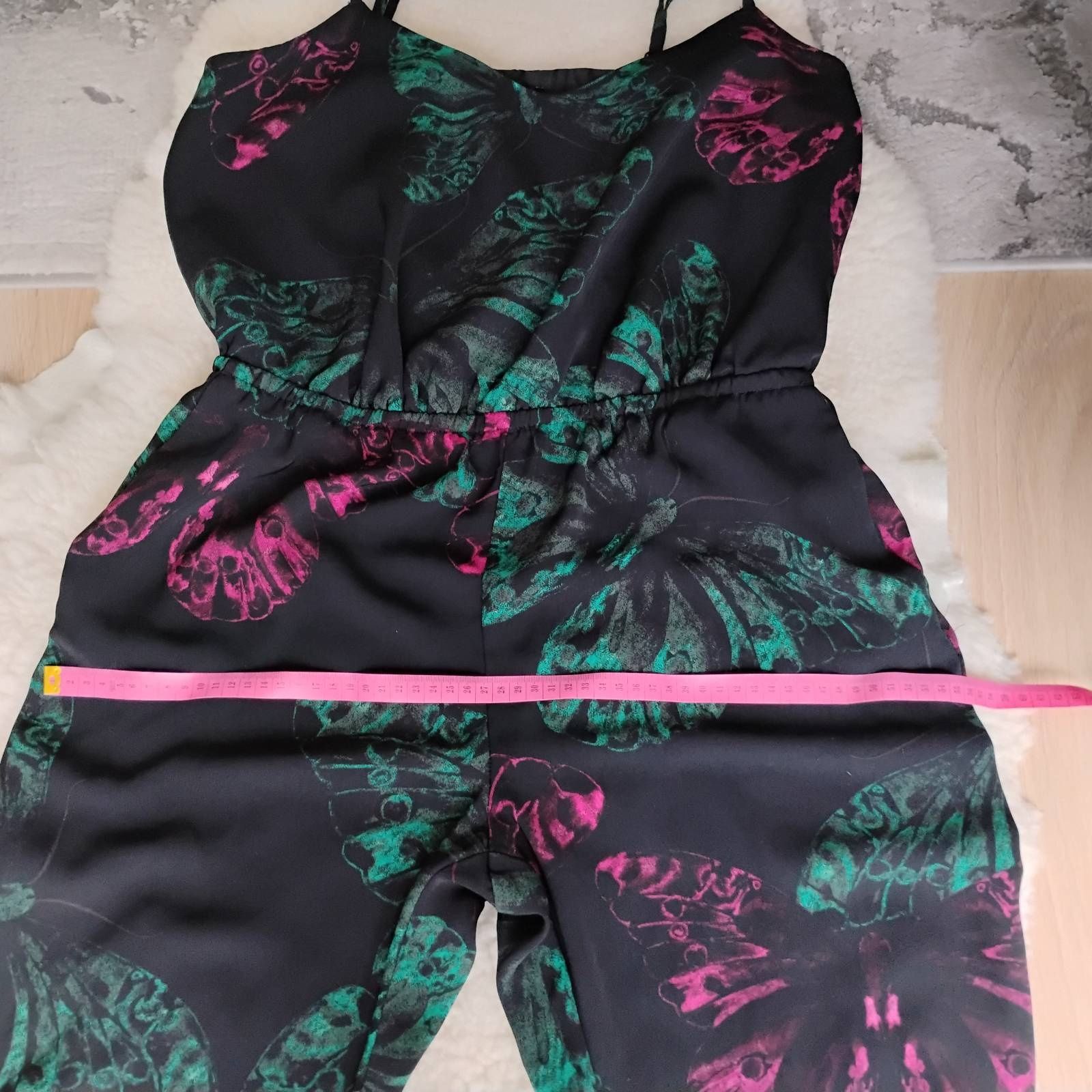 Czarny kombinezon w kolorowe motyle na podszewce Next petites r. XL