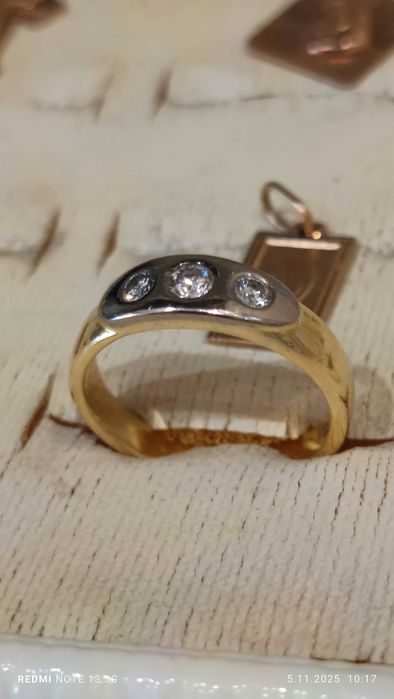 Złoty pierścionek 750 z brylantami 0.25 ct