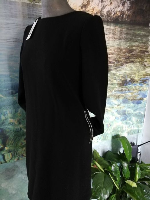 Sukienka klasyczna czarna trapezowa kieszenie