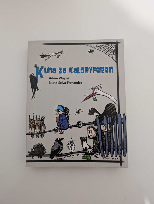 Kuna za kaloryferem Adam Wajrak Nuria Selva Fernandez
