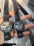 Omega Swatch Faza Ziemi SO33M700 - second-hand, sprawny