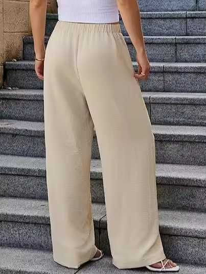 ... палацо брюки с широкими штанинами и контрастными карманами