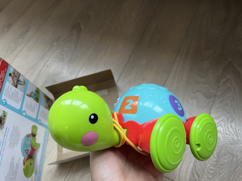 Черепаха каталка бренду Fisher Price