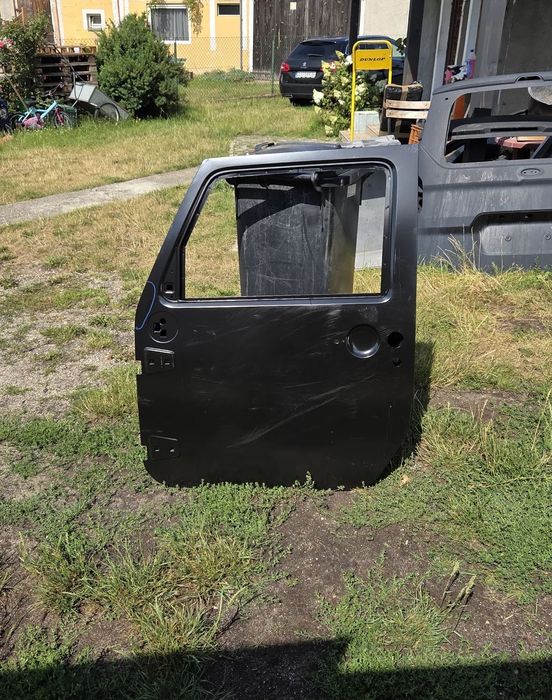 Drzwi lewe przód przednie Jeep Wrangler III JK 68079597AF K68079597AF