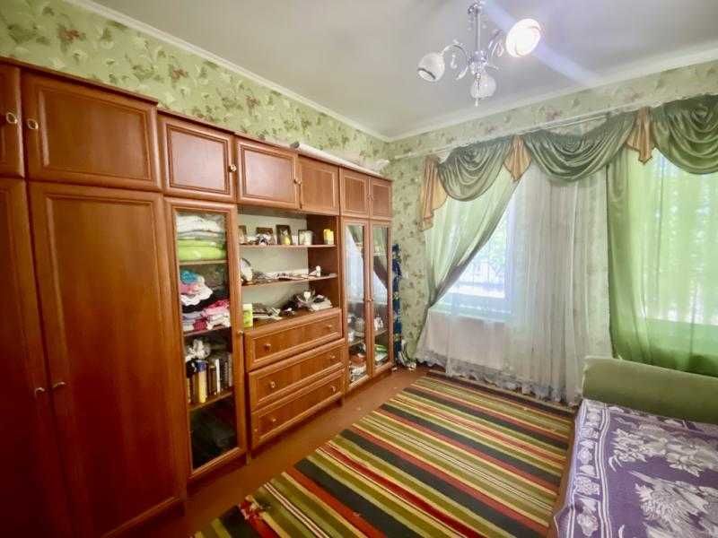 Продам уютный дом в тихом районе.