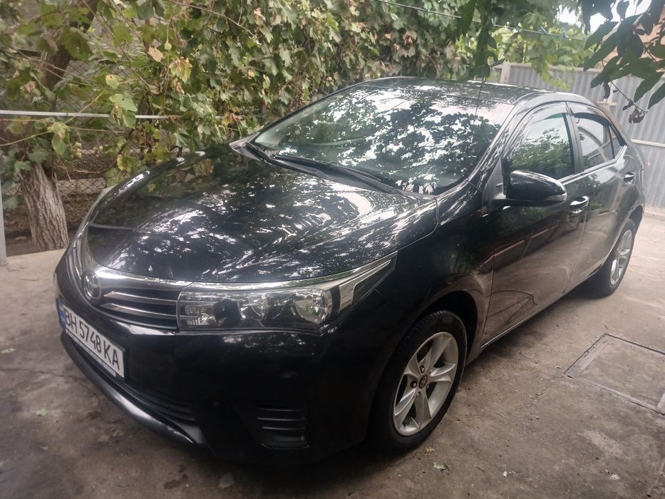 Тойота королла  2014