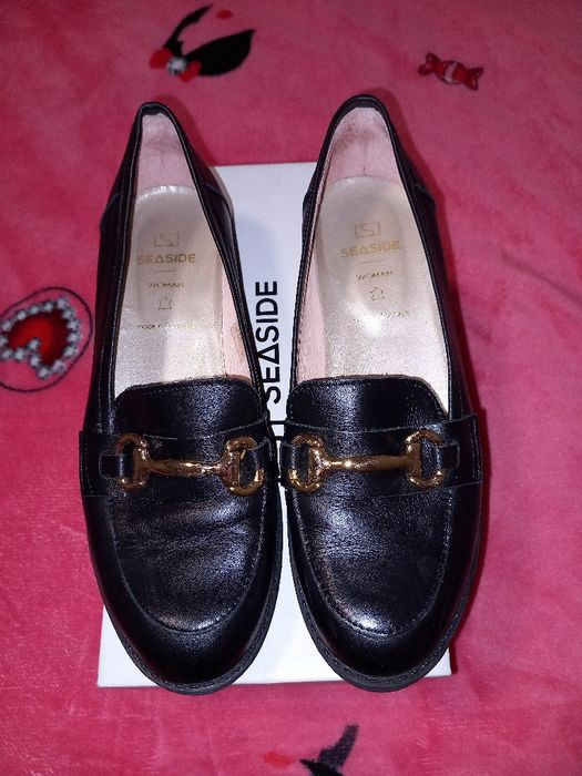 Sapatos de vela de couro
