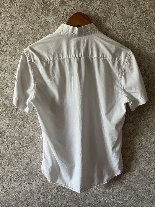 Рубашка короткий рукав, белого цвета, размер L, состояние отличное.