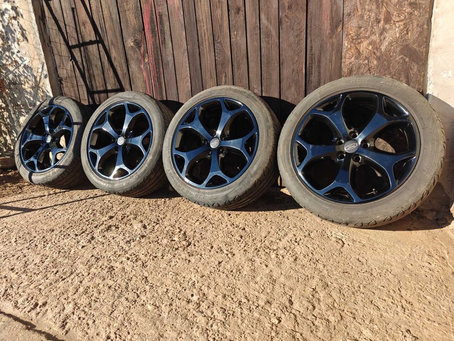 Komplet kół Ford R18 5x108 + opony letnie Kormoran — stan dobry